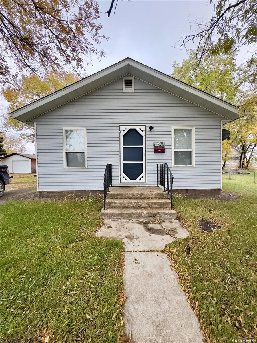 Exterior photo of 2008 2nd Avenue W, Waldheim SK — charming bungalow on a large treed lot with detached garage.